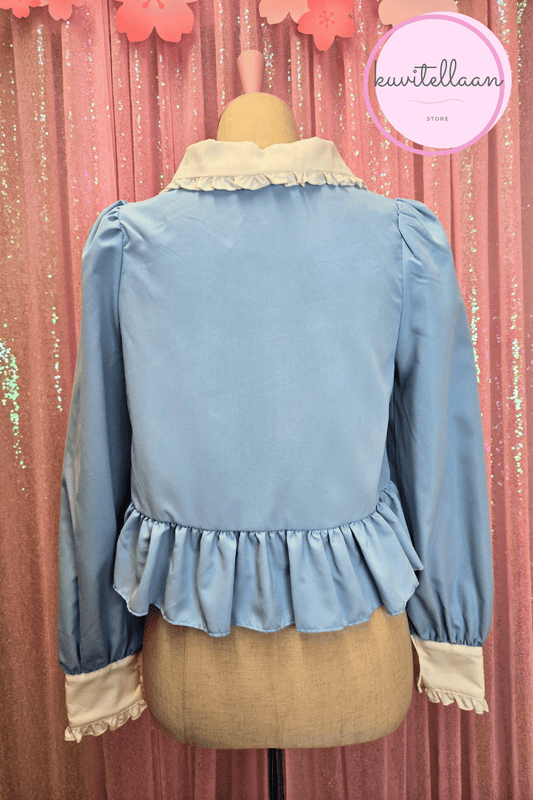 Vaaleansininen peplum pusero (k&auml;ytetty)